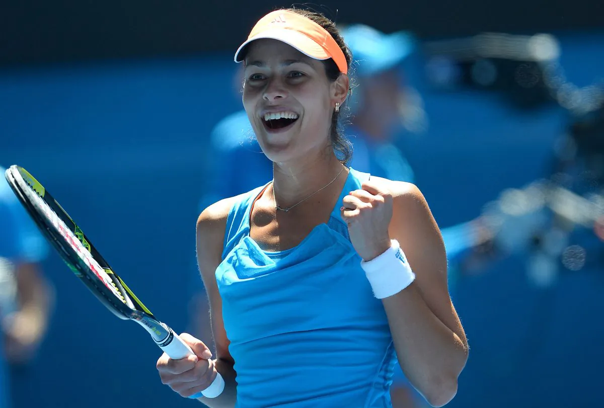 Ana Ivanovic celebrates after victory in her women's singles match against Serena Williams of the US on day seven of the 2014 Australian Open tennis tournament in Melbourne on January 19, 2014. (William West/AFP/Getty Images)