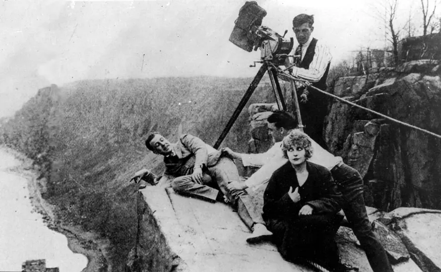 Movie Studio Still Image from The House of Hate - at Cliffhanger Rock in Fort Lee. The image is of Pearl White - the original Damsel in Distress - Pauline - of the Perils of Pauline. This image is the iconic one used by the Fort Lee Film Commission.