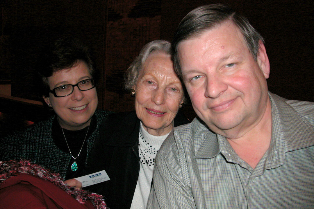 Roma Bakery owner Philip DiFilippo and two of his family members enjoyed Shen Yun Performing Arts at Hamilton Place Theatre on Jan. 11, 2014. (Renee Zhang/Epoch Times)