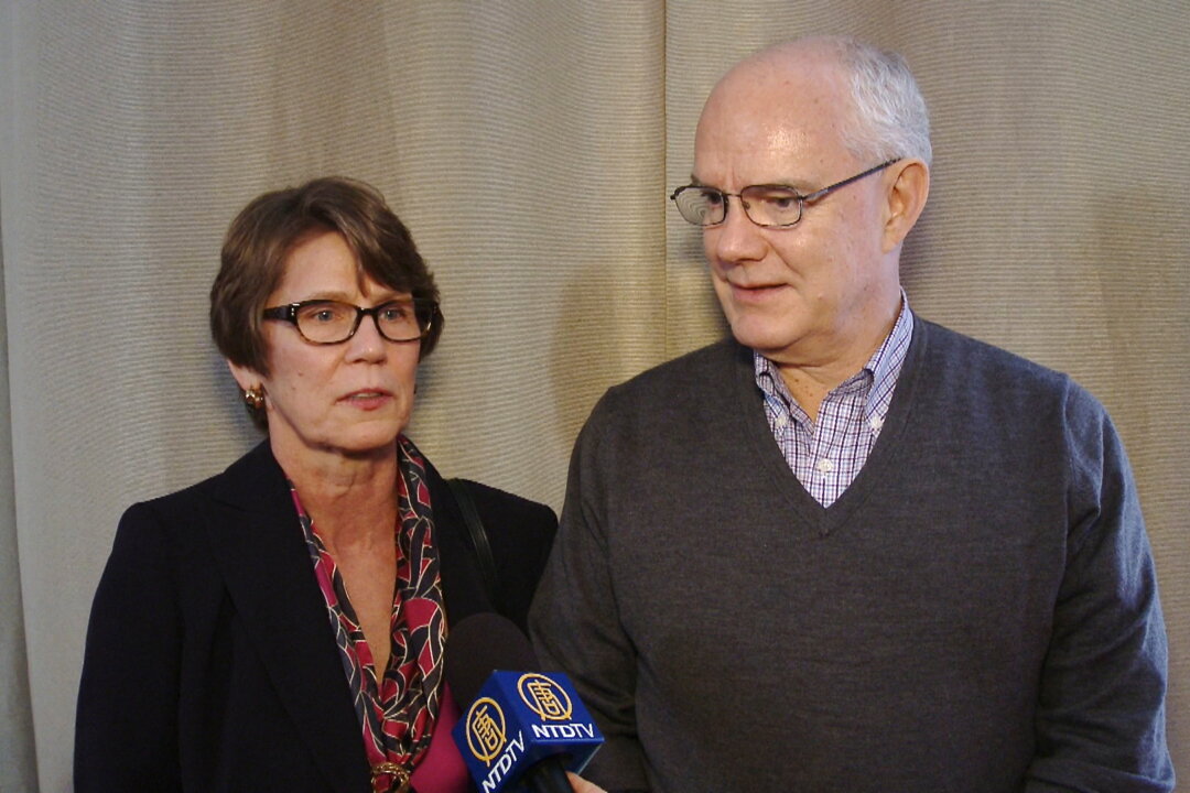 Professor Brian Nelson and his wife, Penne, enjoy Shen Yun Performing Arts at Washington's Kennedy Center Opera House, on Jan. 25. (Courtesy of NTD Television)