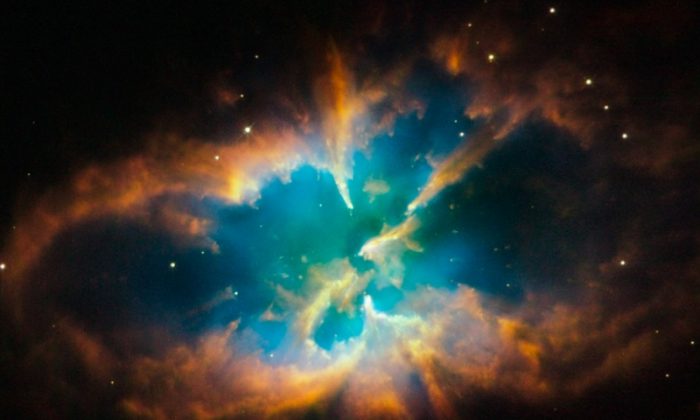 NGC 2818 is a beautiful planetary nebula, the gaseous shroud of a dying sun-like star. It could well offer a glimpse of the future that awaits our own Sun after spending another 5 billion years or so steadily using up hydrogen at its core, and then finally helium, as fuel for nuclear fusion. (NASA, ESA, Hubble Heritage Team, STScI / AURA)