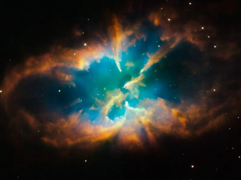 NGC 2818 is a beautiful planetary nebula, the gaseous shroud of a dying sun-like star. It could well offer a glimpse of the future that awaits our own Sun after spending another 5 billion years or so steadily using up hydrogen at its core, and then finally helium, as fuel for nuclear fusion. (NASA, ESA, Hubble Heritage Team, STScI / AURA)