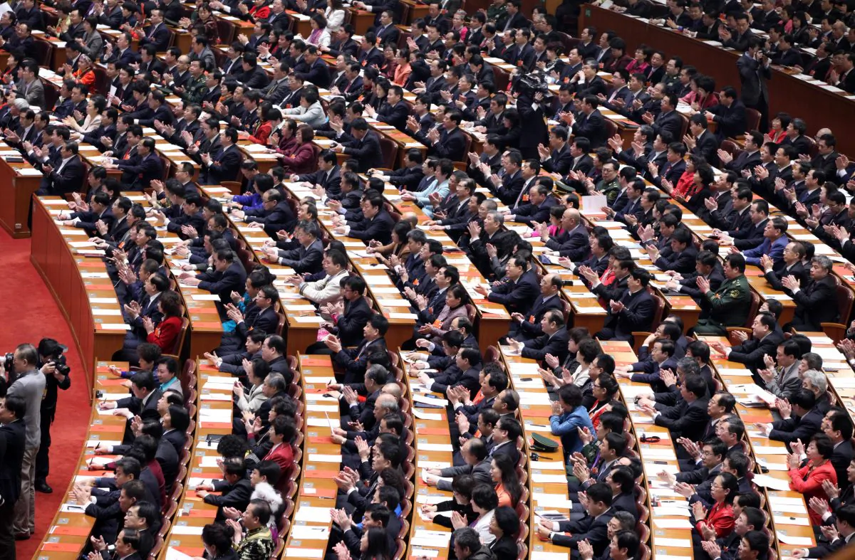 Delegates attend the closing session of the National People's Congress (NPC) at the Great Hall of the People in Beijing, China. (ChinaFotoPress/China FotoPress via Getty Images)