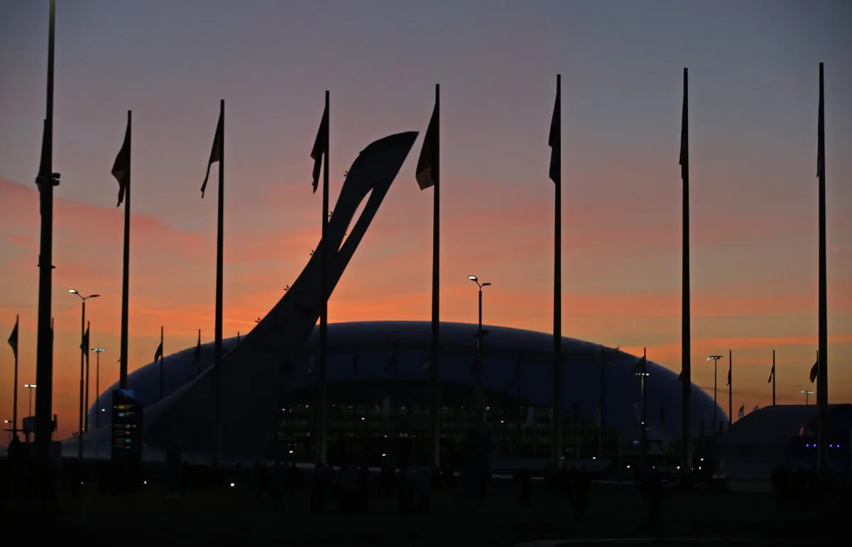 The Olympic caldron is seen as the sun sets before the opening ceremony of the 2014 Winter Olympics in Sochi, Russia, Friday, Feb. 7, 2014. (AP Photo/Darron Cummings)