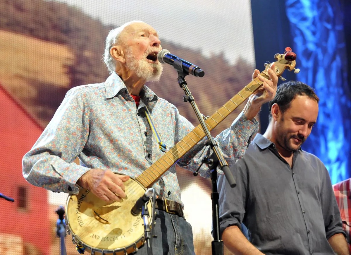 Pete Seeger and Dave Matthews perform during the Farm Aid 2013 concert in Saratoga Springs, N.Y., on Sept. 21, 2013. (Hans Pennink/AP)