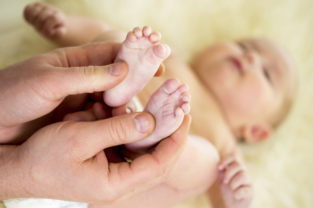 Parents can easily learn acupressure massage techniques that can help their child through common health issues such as coughs, constipation, and sleep problems. (Photos.com)