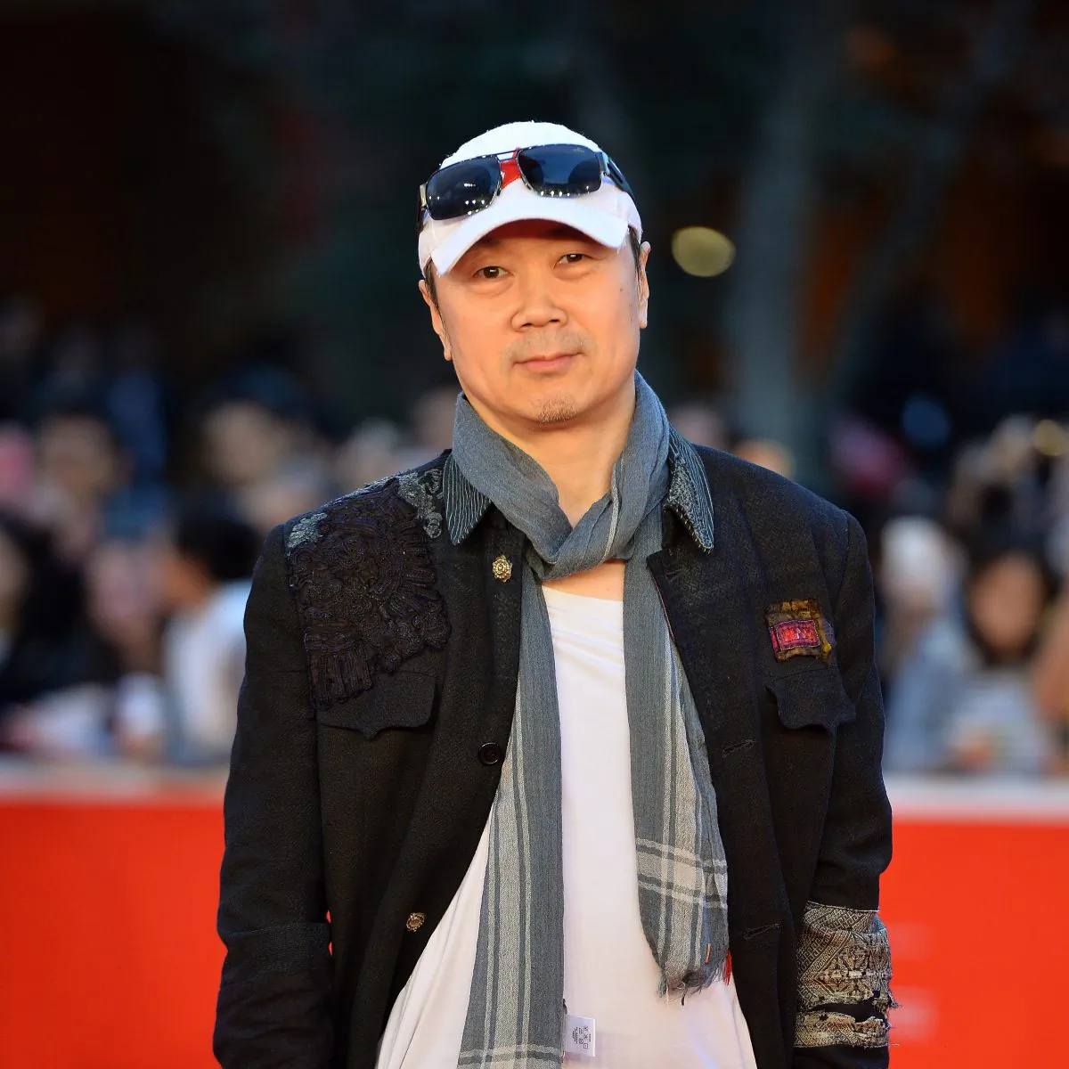 Film director and rocker Cui Jian attends the “Blue Sky Bones” premiere during The 8th Rome Film Festival at Auditorium Parco Della Musica on Nov. 13, 2013, in Rome, Italy. (Tullio M. Puglia/Getty Images)
