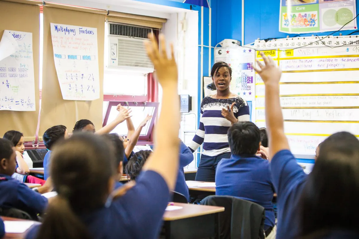 A fifth-grade teacher leading a homeroom class at Achievement First Bushwick Charter School in Brooklyn, New York, on Jan. 30, 2014. (Petr Svab/The Epoch Times)