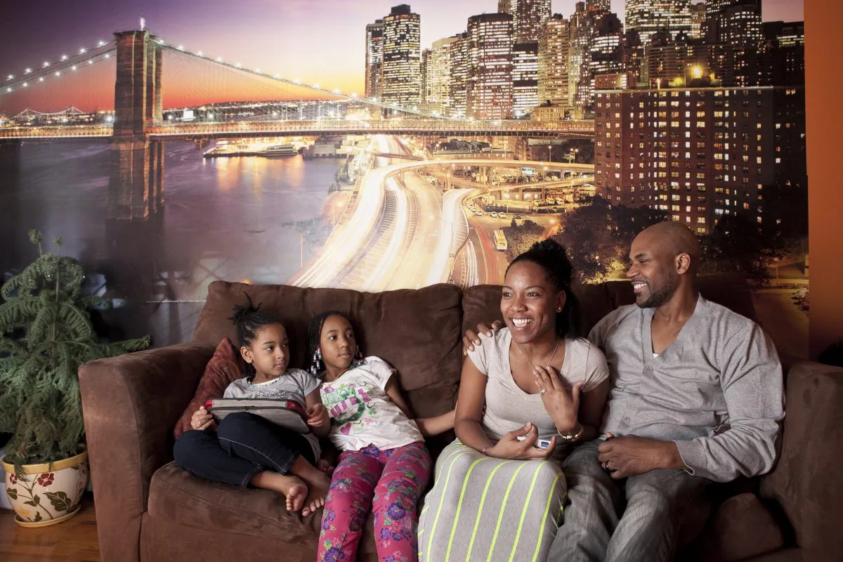 (R-L) Jarice James, Karen James, Samarah, and Amira at their apartment in Park Slope, Brooklyn, New York, on Feb. 16, 2014. (Samira Bouaou/Epoch Times)