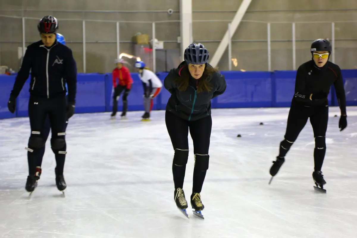 Joy Weber (C) participates in speedskating practice for the first time at the Flushing Meadows Aquatic Center and World Ice Arena, Feb. 17, 2014. Weber was inspired to try the sport for the first time after watching the Winter Olympics. (Ivan Pentchoukov/Epoch Times)
