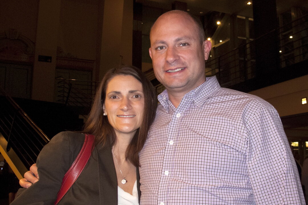 Liz and Chris Becze enjoy Shen Yun performing Arts at Denver's Buell Theatre, on Feb. 19. (Youzhi Ma/Epoch Times)