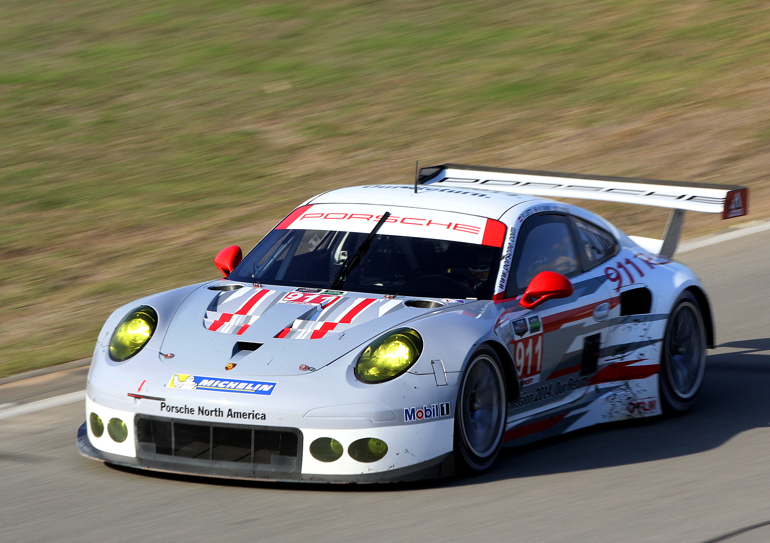 The #911 Porsche North America RSR topped GTLM in the afternoon session as its sister car had in the morning. (Chris Jasurek/Epoch Times) The #911 Porsche North America RSR topped GTLM in the afternoon session as its sister car had in the morning. (Chris Jasurek/Epoch Times)