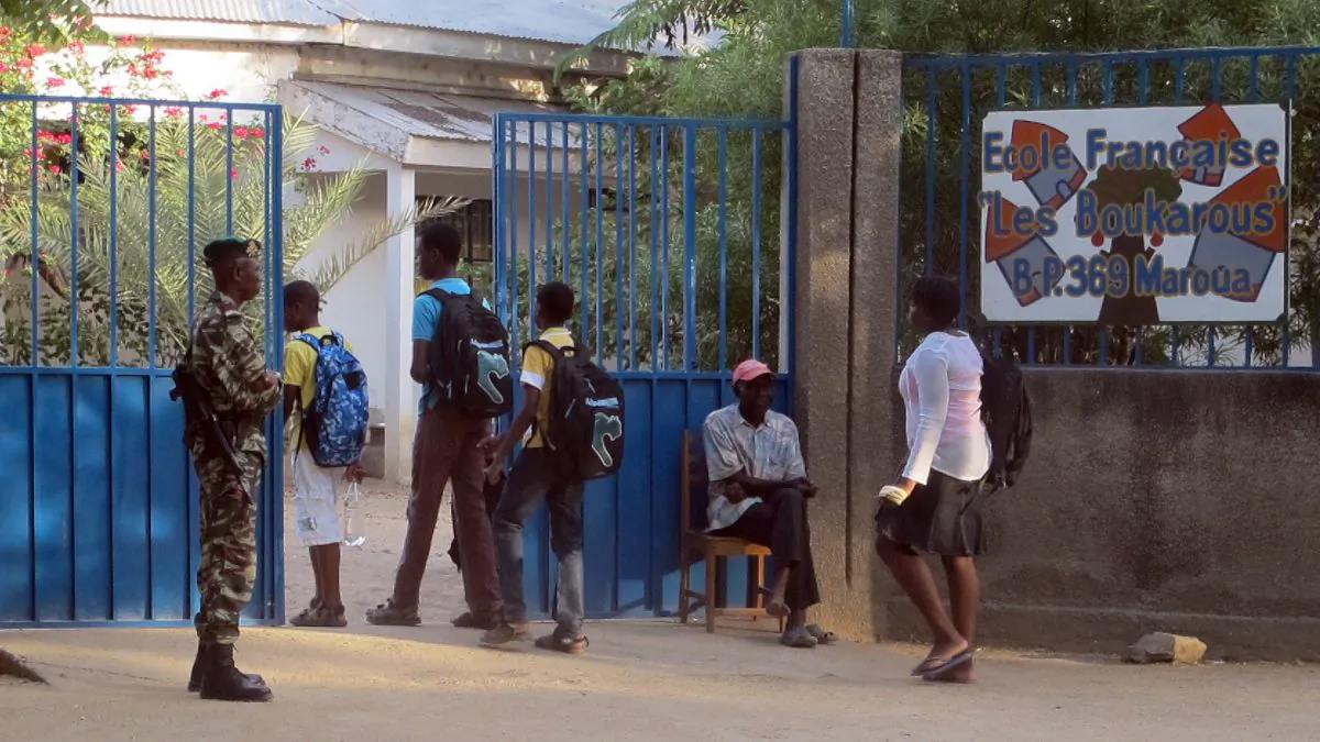 CA Cameroon soldier keeps watch over the entrance to a French school in this November 2013 file photo, because of danger from the Boko Haram sect. (Rennier Kaze/AFP/Getty Images)