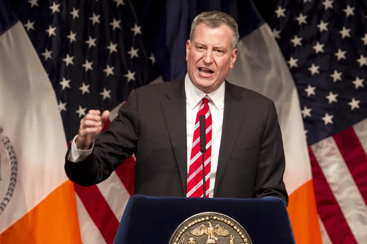 New York Mayor Bill de Blasio delivers his State of the City address at LaGuardia Community College in the Queens borough of New York, Monday, Feb. 10, 2014, in New York. De Blasio, delivering one of the most important speeches of his young administration, outlined his vision for New York and offered a glimpse into his signature goal of fighting the city's widening income inequality gap. (AP Photo/Mark Lennihan)