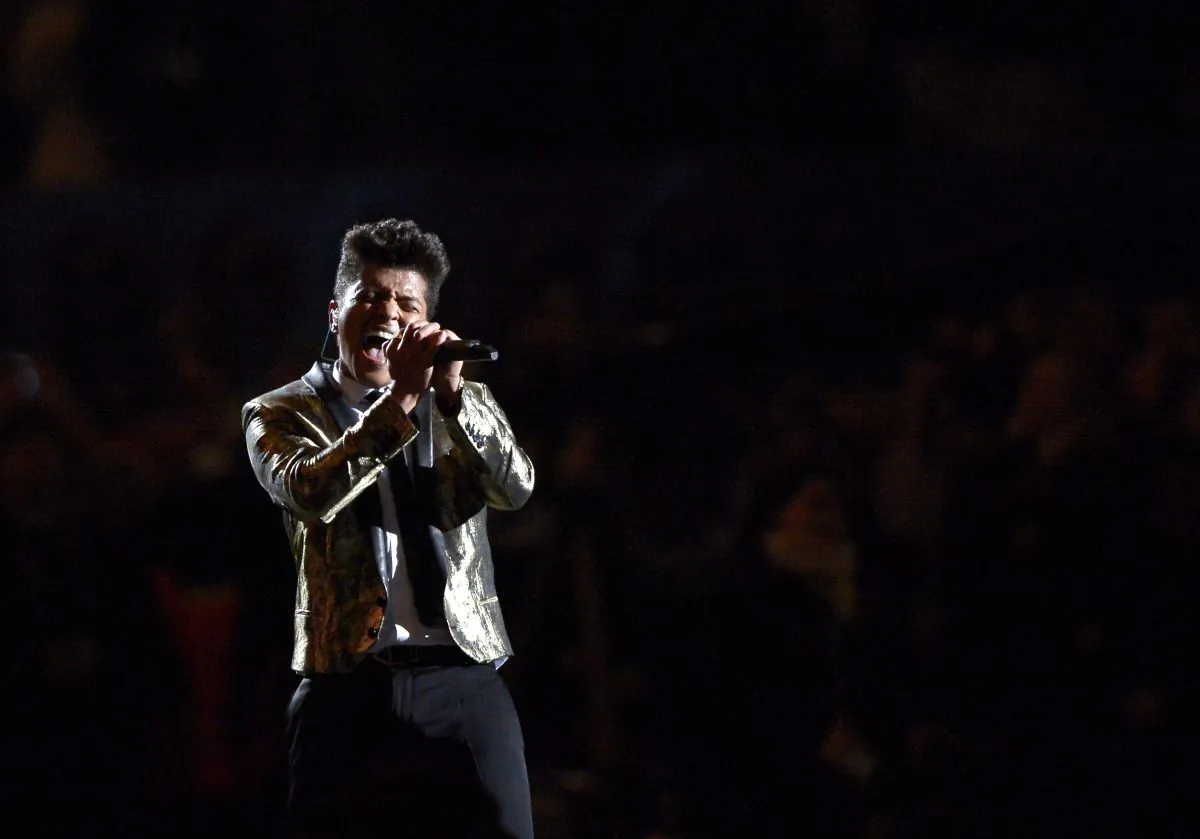 Bruno Mars performs during the halftime show of the NFL Super Bowl XLVIII football game between the Seattle Seahawks and the Denver Broncos Sunday, in East Rutherford, N.J., on Feb. 2, 2014. (AP Photo/Bill Kostroun)