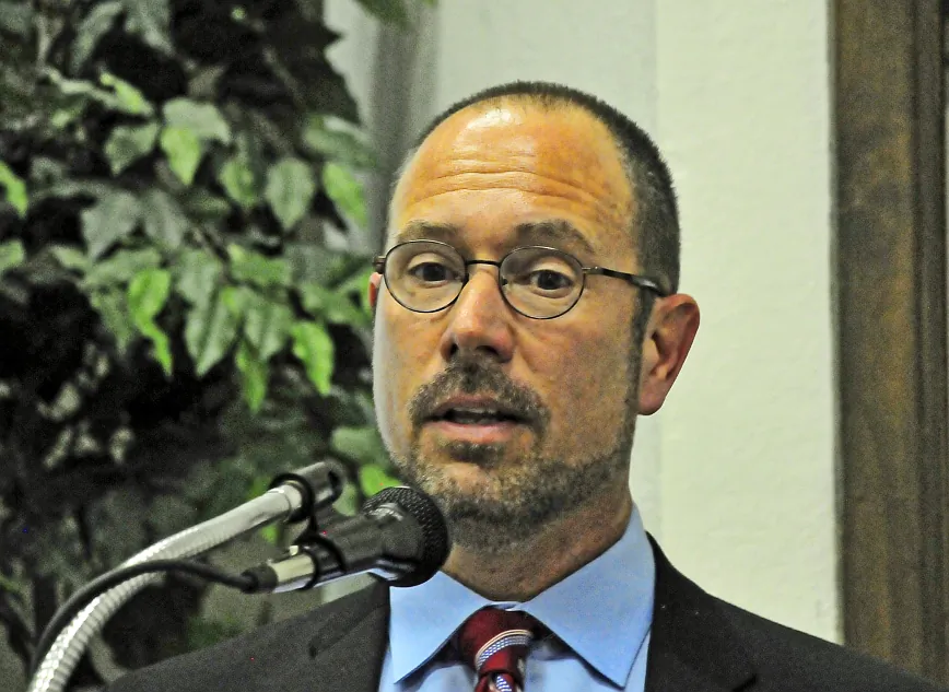 Greg Autry speaks at a meeting about China, human rights, the massive loss of jobs in the USA and other related matters. His challenge was not to the U.S. government, but to its citizens. (Robin Kemker/Epoch Times) 