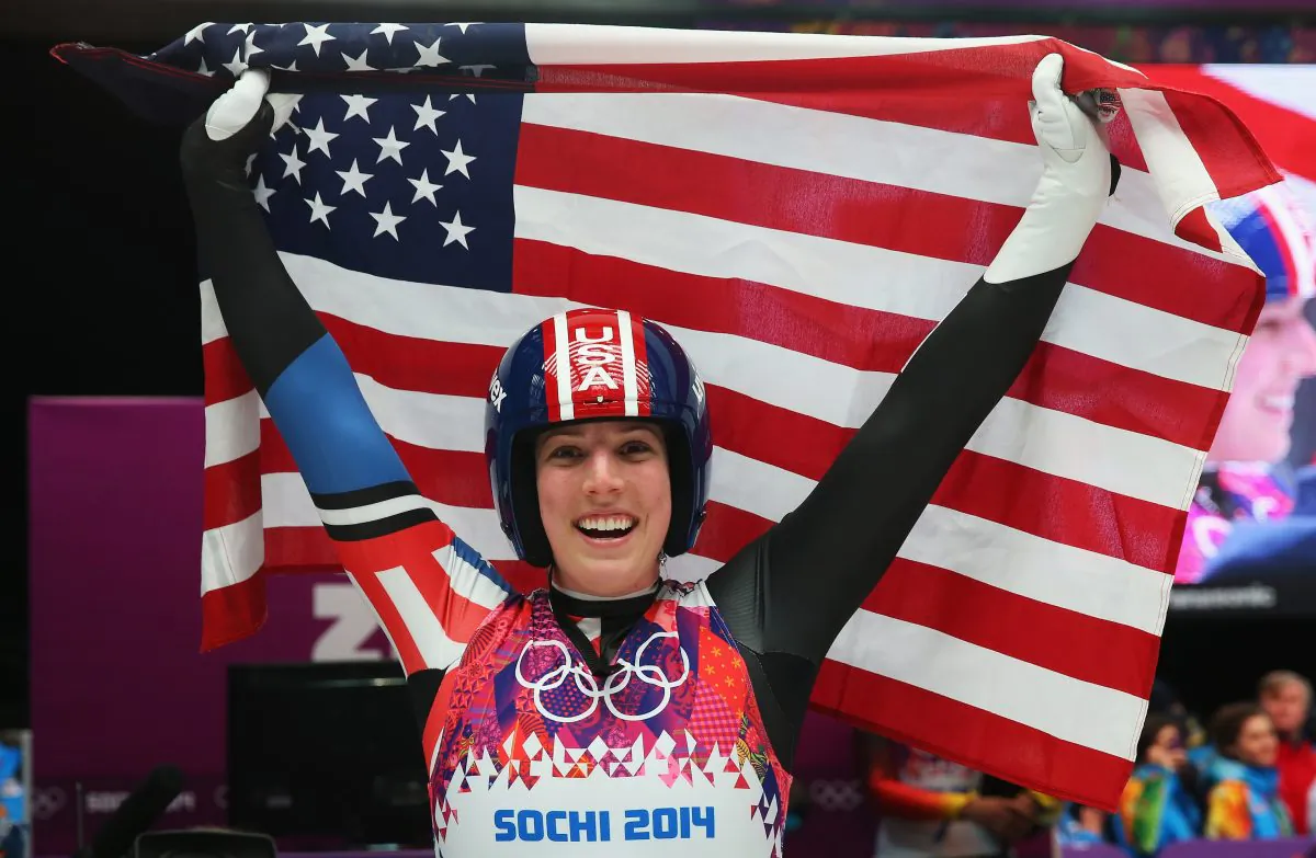 Erin Hamlin of the United States celebrates during the Women's Luge Singles on Day 4 of the Sochi 2014 Winter Olympics at Sliding Center Sanki on February 11, 2014 in Sochi, Russia. (Alexander Hassenstein/Getty Images)