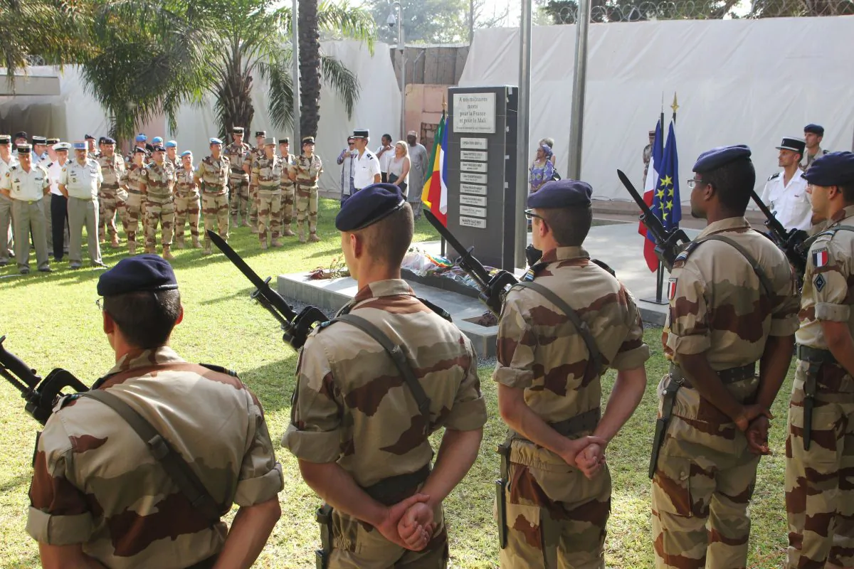 French soldiers stand guard in Bamako, Mali as the French Defense Minister and his Malian counterpart attend an inauguration ceremony for a new monument created in honor of French soldiers killed during the recent military intervention in Mali, Jan. 19, 2014. (Habibou Kouyate/AFP/Getty Images)