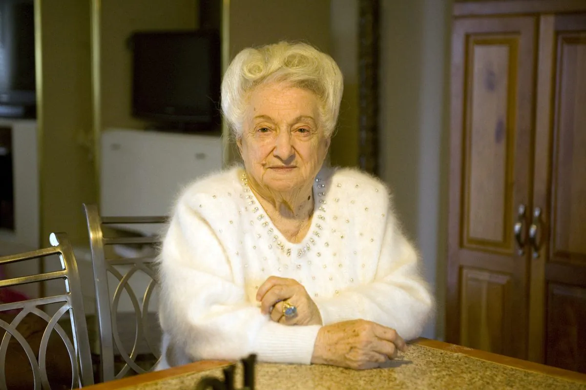 Sylvia Anthony, founder of women's shelter Sylvia's Haven, sits in the kitchen of her home in Revere, Mass., on Feb. 3, 2014. (Te Chen/Epoch Times)