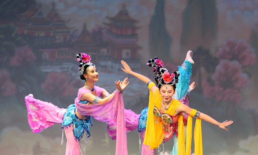 Shen Yun Performing Arts dancers displaying exquisite postures typical of Chinese classical dance. Chinese medicine has a theory that may explain how performing arts can be heal and nurture. (2013 SHEN YUN PERFORMING ARTS)