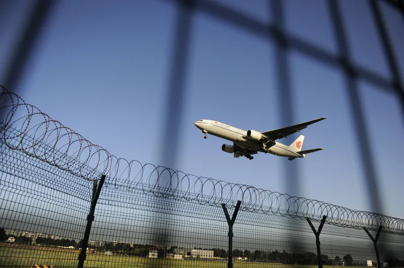 An Air China plane prepares to land at Beijing Capital International airport on Sept. 4, 2012. (WANG ZHAO/AFP/GettyImages)