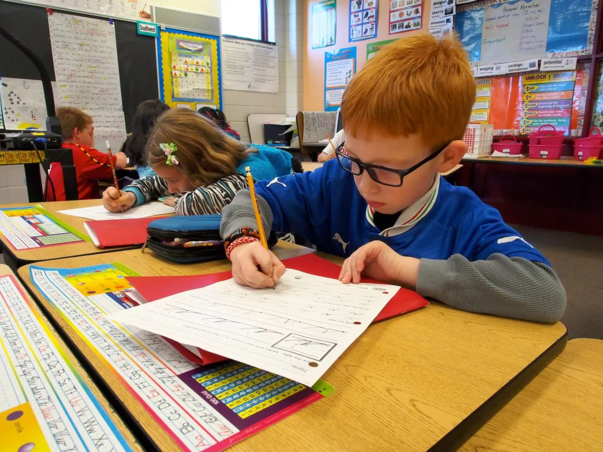 Pupils practice cursive writing on Oct. 15, 2013 at Triadelphia Ridge Elementary School in Ellicott City, Maryland. (Robert MacPherson/AFP/Getty Images)