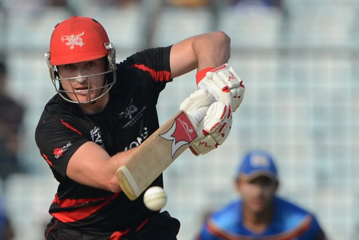 Hong Kong cricket captain Jamie Atkinson plays a shot during the ICC Twenty20 World Cup fifth qualifying cricket match against Afghanistan at the Zohur Ahmed Chowdhury Stadium in Chittagong on Mar 18. Hong Kong lost by 7 wickets with Atkinson scoring 31 runs including five 4's and one 6. (MUNIR UZ ZAMAN/AFP/Getty Images)