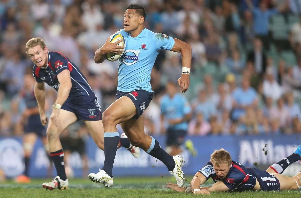 Waratahs full-back Israel Folau breaks the Rebels defence on Saturday March 22, 2014. The Waratahs will miss Folau due to injury in their match against the Sharks on Saturday March 29, 2014 in Durban, South Africa. (Mark Metcalfe/Getty Images)