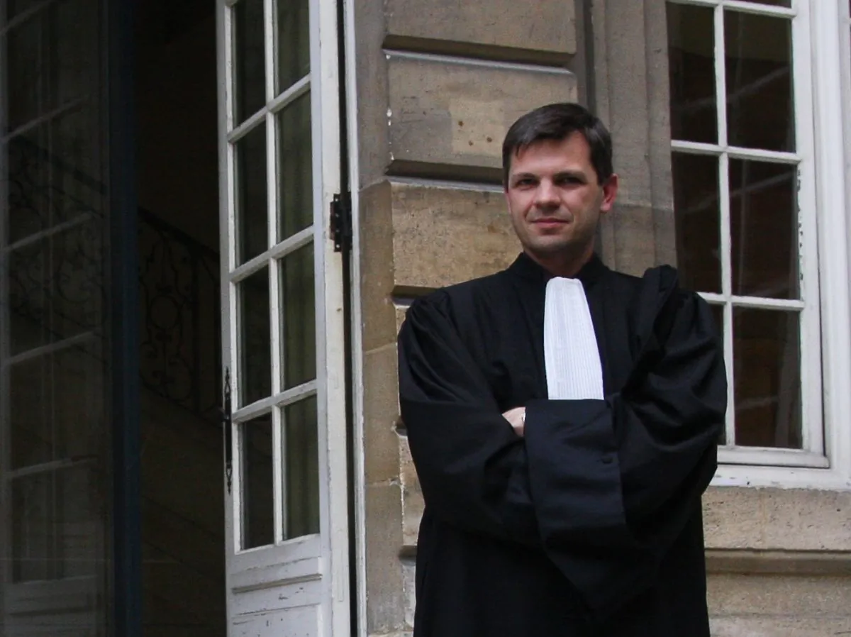 Attorney Gabard, hired by the Falun Gong practitioners to represent them, stands outside of the Paris Administrative Court after the hearing on March 26. (Minghui.org)