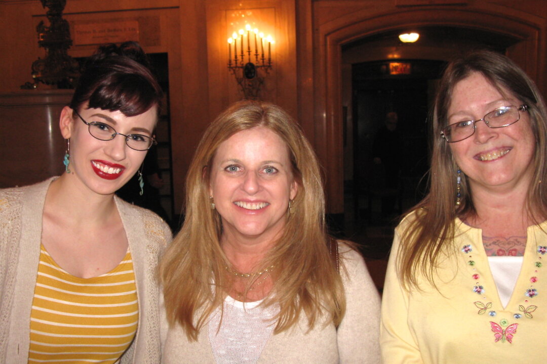 (L to R) Marie Barron, Anna Chouinard, and Melissa Chouinard enjoy Shen Yun Performing Arts at the Citi Wang Theatre in Boston on Feb. 28, 2014. (Tim Pi/Epoch Times)