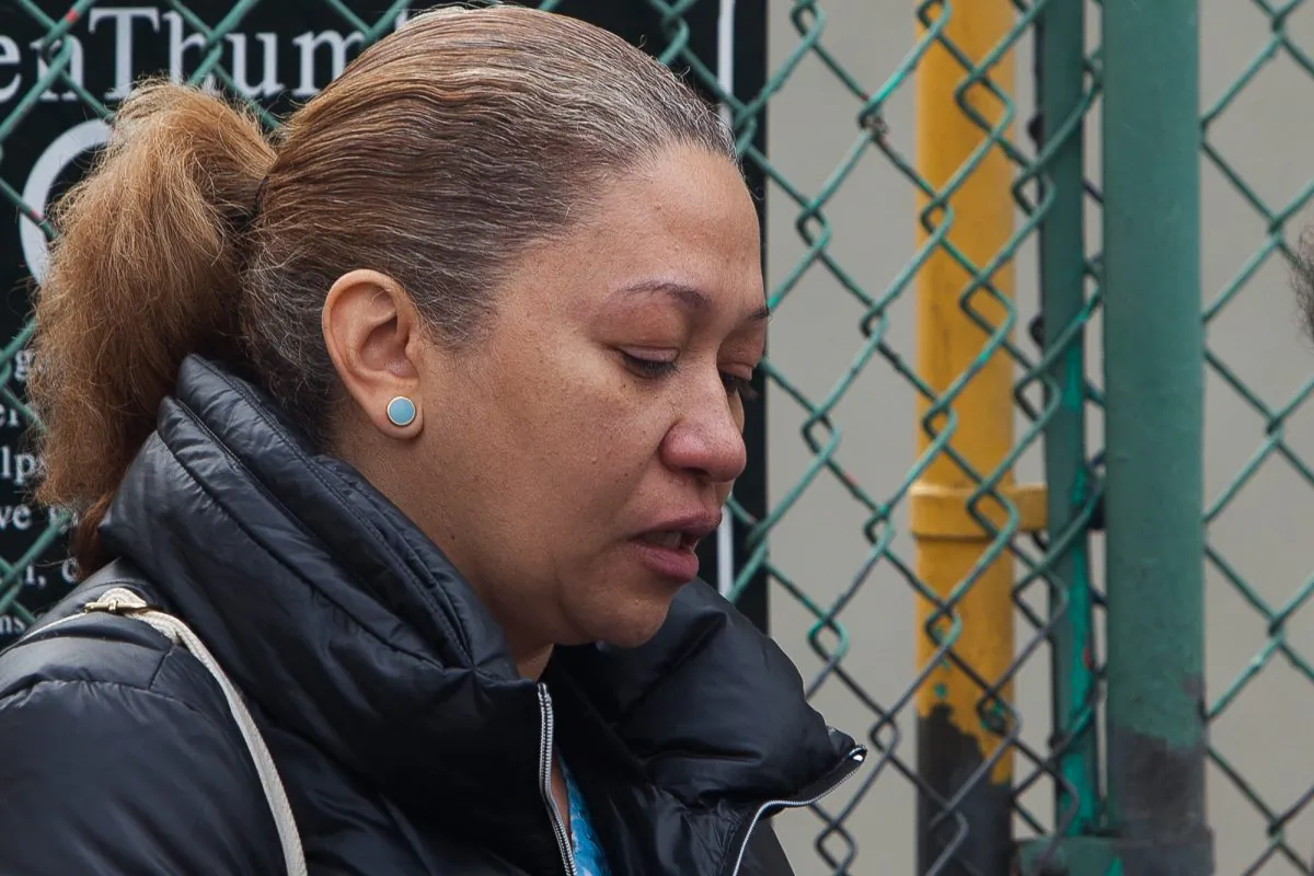 Anna Petances recollects the happenings after a gas explosion leveled her neighboring building, East Harlem, New York, March 12, 2014. (Petr Svab/Epoch Times)