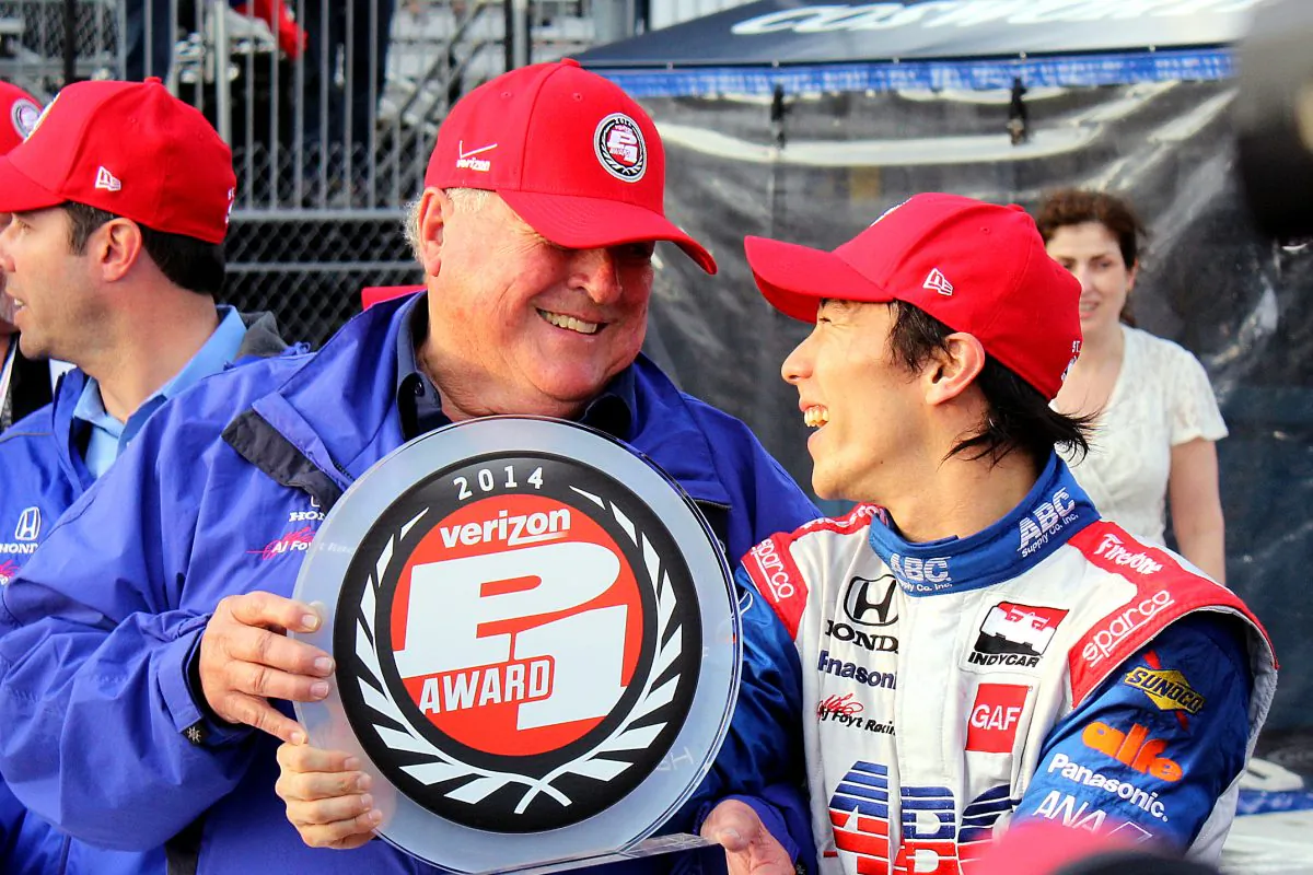 Takuma Sato (R) and team owner, racing legend AJ Foyt, share a laugh after winning the Verizon P1 Pole Award for the IndyCar Firestone Grand Prix of St. Petersburg. (Chris Jasurek/Epoch Times)