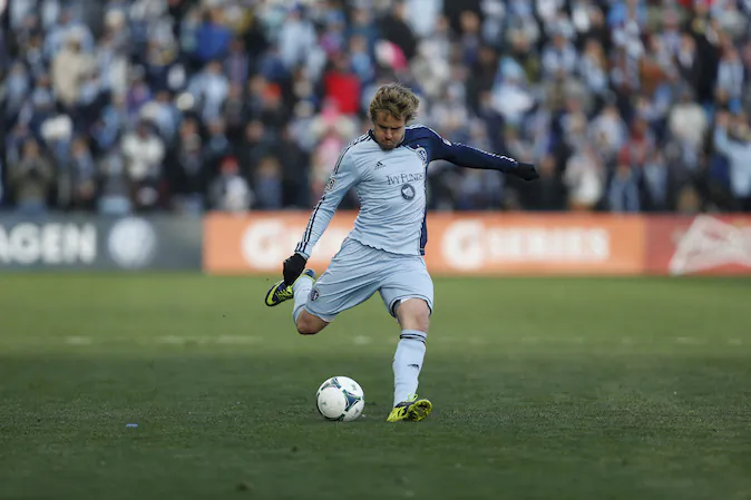 Chance Myers #7 of Sporting Kansas City kicks the ball during the MLS Cup Final at Sporting Park against the Real Salt Lake on December 7, 2013 in Kansas City, Kansas. (Photo by Ed Zurga/Getty Images)