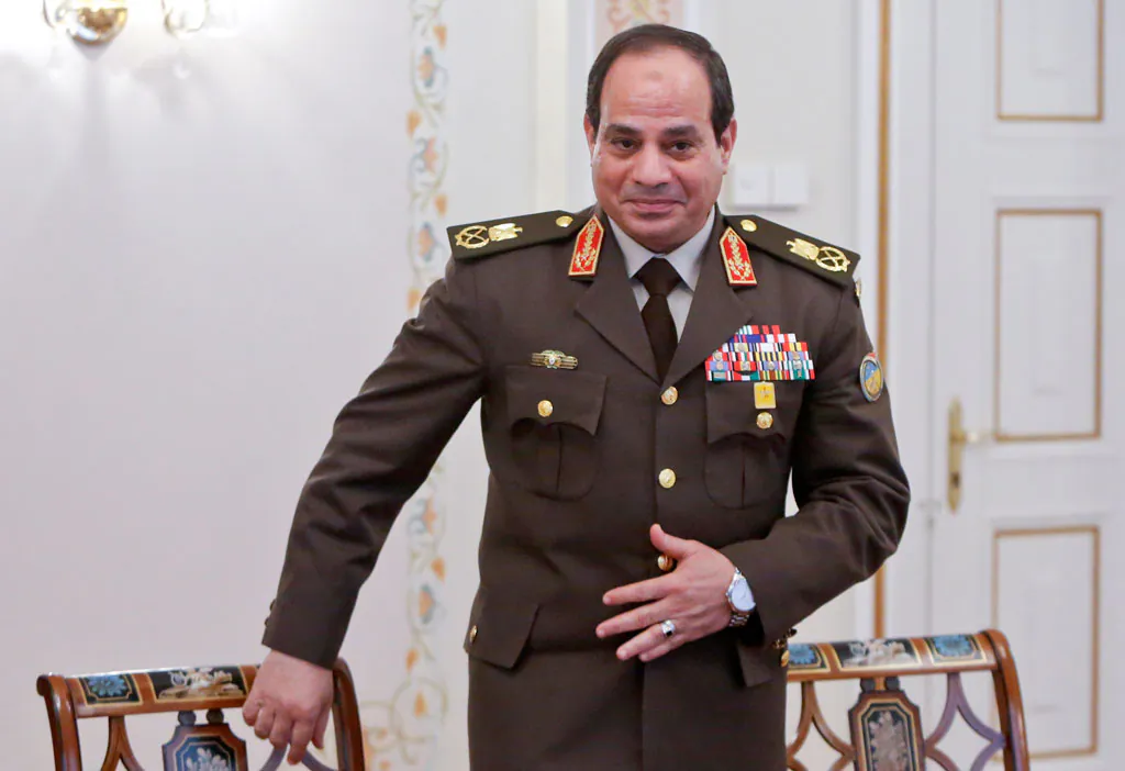 Egyptian army chief Abdel Fattah al-Sisi attends a meeting with Russian President Vladimir Putin in Novo-Ogaryovo, outside Moscow, on February 13, 2014. Abdel Fattah al-Sisi, who is likely Egypt's new president, arrived in Moscow to negotiate a $2-billion arms deal with Russia meant to replace subsiding assistance from old ally Washington. (Maxim Shemetov/AFP/Getty Images)