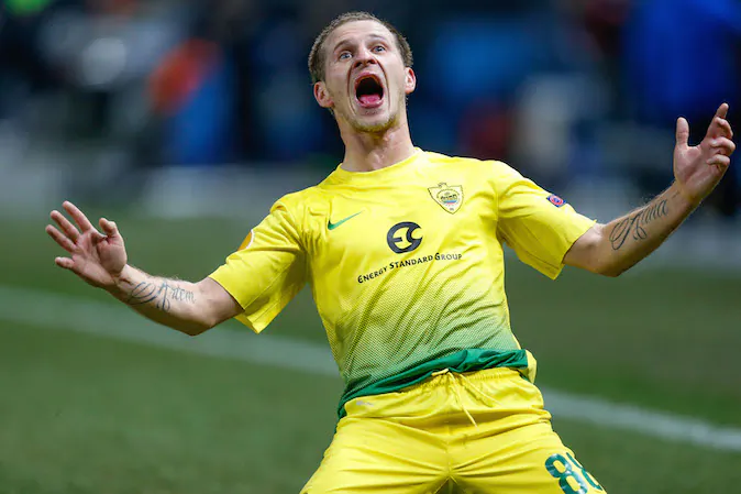 Anzhi Makhachkala's forward Olexandr Aliyev celebrates after scoring during the round of 32 Europa League UEFA football match between KRC Genk and Anzhi Makhachkala at the Fenix Stadium in Genk on February 27, 2014. (BRUNO FAHY/AFP/Getty Images)
