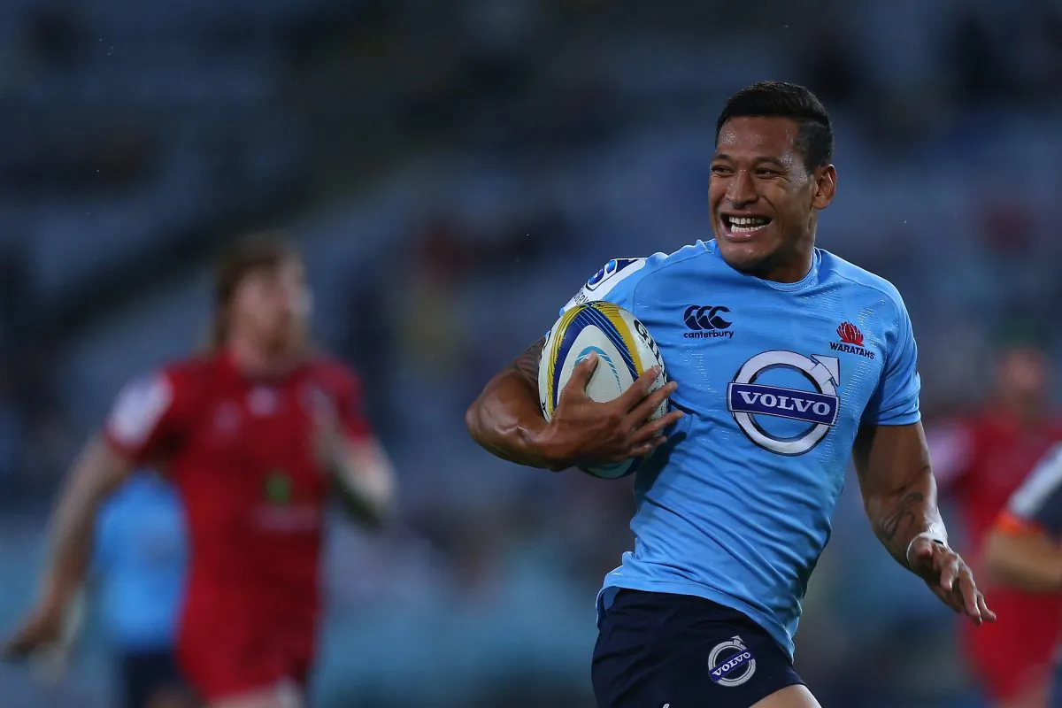 Waratahs fullback Israel Falou laughs his way to the try-line. His team defeated the Reds 32-5 in the round three Super Rugby match on Mar 1, 2014, at ANZ Stadium in Sydney, Australia. (Joosep Martinson/Getty Images)