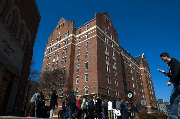WASHINGTON, DC - MARCH 20, 2014: A student walks by the McCarthy Hall, dormitory on the Georgetown University campus. (Photo by Katherine Frey/The Washington Post via Getty Images)