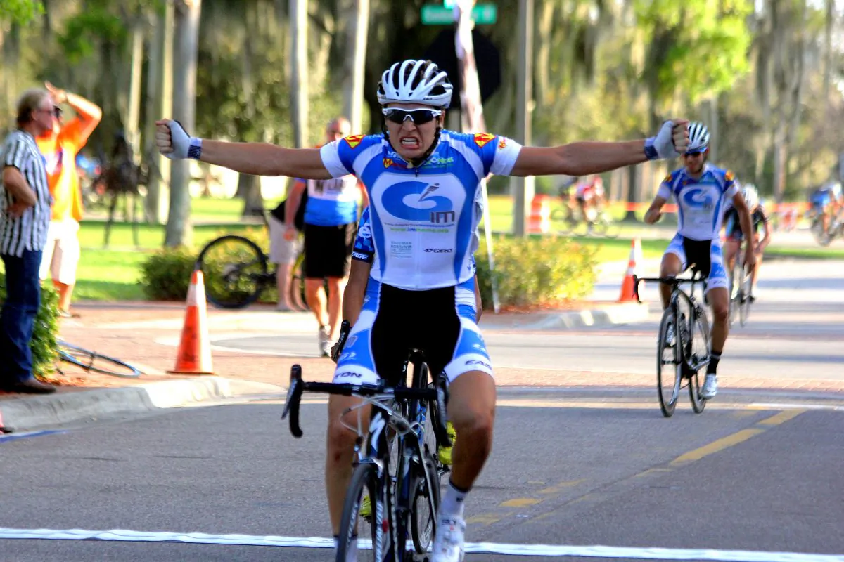 Silverberg roars in triumph as he crosses the finish line first to win the Chain of Lakes Cycling Classic Pro 1/2 criterium Sunday evening. (Chris Jasurek/Epoch Times)