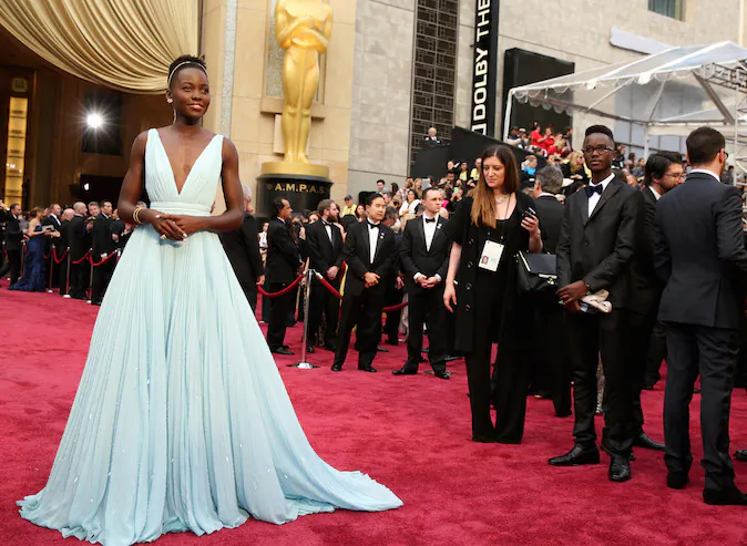 Lupita Nyong'o arrives at the Oscars on Sunday, March 2, 2014, at the Dolby Theatre in Los Angeles. (Photo by Matt Sayles/Invision/AP)