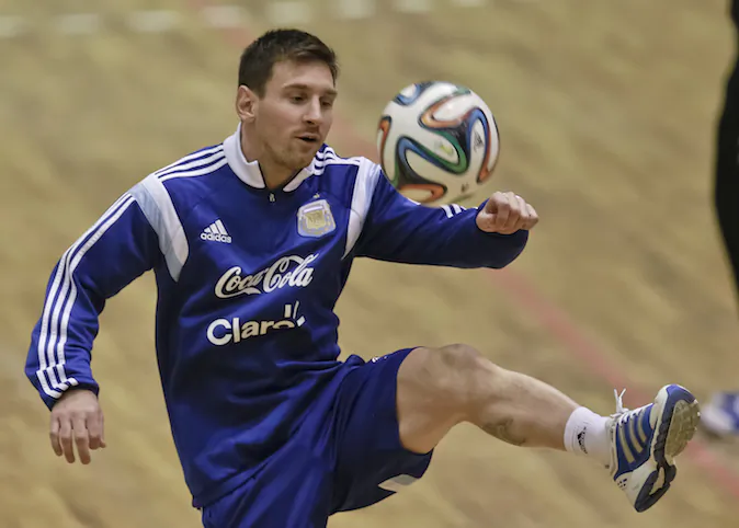 Argentina's Lionel Messi controls a ball up during a team training session in Bucharest, Romania, Monday, March 3, 2014. Argentina will play a friendly soccer match against Romania on Wednesday Mar. 5. (AP Photo/Vadim Ghirda)