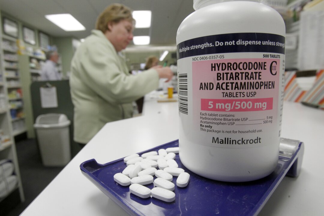 Hydrocodone pills, also known as Vicodin, at a pharmacy in Montpelier, Vt., on Feb. 19, 2013. Drug overdose deaths rose for the 11th straight year, federal data show, and most of them were accidents involving addictive painkillers despite growing attention to risks from these medicines. As in previous recent years, opioid drugs—which include OxyContin and Vicodin—were the biggest problem, contributing to 3 out of 4 medication overdose deaths. (AP Photo/Toby Talbot)