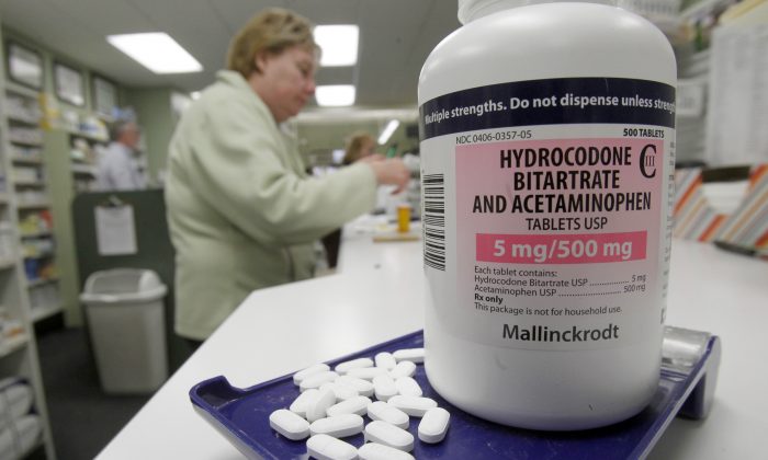 Hydrocodone pills, also known as Vicodin, at a pharmacy in Montpelier, Vt., on Feb. 19, 2013. Drug overdose deaths rose for the 11th straight year, federal data show, and most of them were accidents involving addictive painkillers despite growing attention to risks from these medicines. As in previous recent years, opioid drugs—which include OxyContin and Vicodin—were the biggest problem, contributing to 3 out of 4 medication overdose deaths. (AP Photo/Toby Talbot)