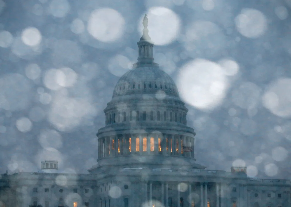 Snow falls in front of the U.S. Capitol in Washington, D.C., March 3, 2014. (Mark Wilson/Getty Images)