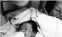 Chinese ‘Miracle Baby’ Born in Crash That Killed Mother