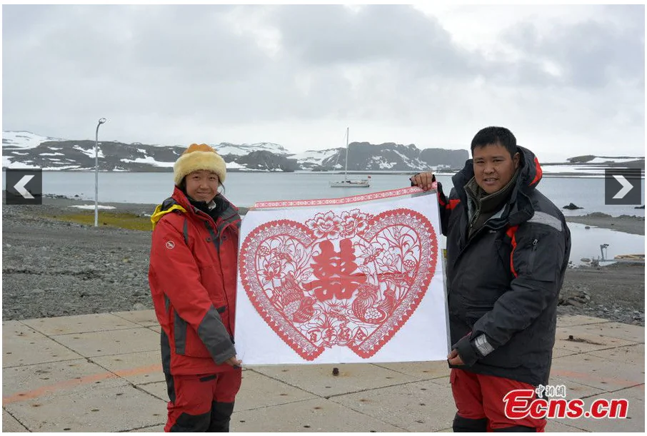 Screenshot showing Zhang Xinyu and Liang Hong celebrating their wedding in Antarctica on Feb. 25, after a 231-day global journey. (Screenshot/People's Daily)