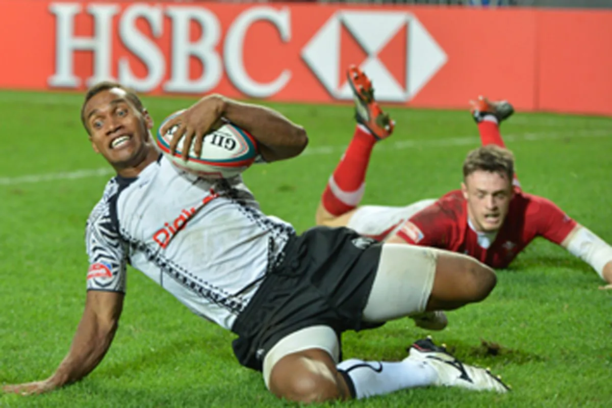 Hat-trick on ... Osea Kolinisau scores his second of three trys as Fiji steam-roll Wales in the second half of the Cup Final of the Cathay Pacific/HSBC Hong Kong Sevens on Sunday March 24, 2013. Kolinisau will skipper Fiji in their campaign to win three consecutive HK 7’s this weekend.
Image credit. (Bill Cox/Epoch Times Staff)