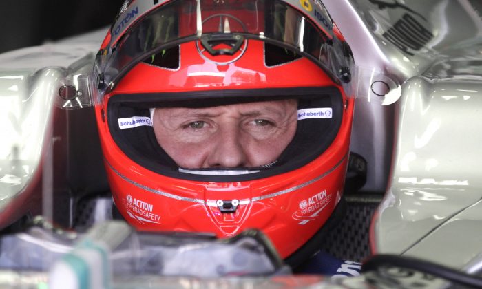 Michael Schumacher, of Germany, sits in his car during a free practice at the Interlagos race track in Sao Paulo, Brazil. (AP Photo/Victor Caivano, File)