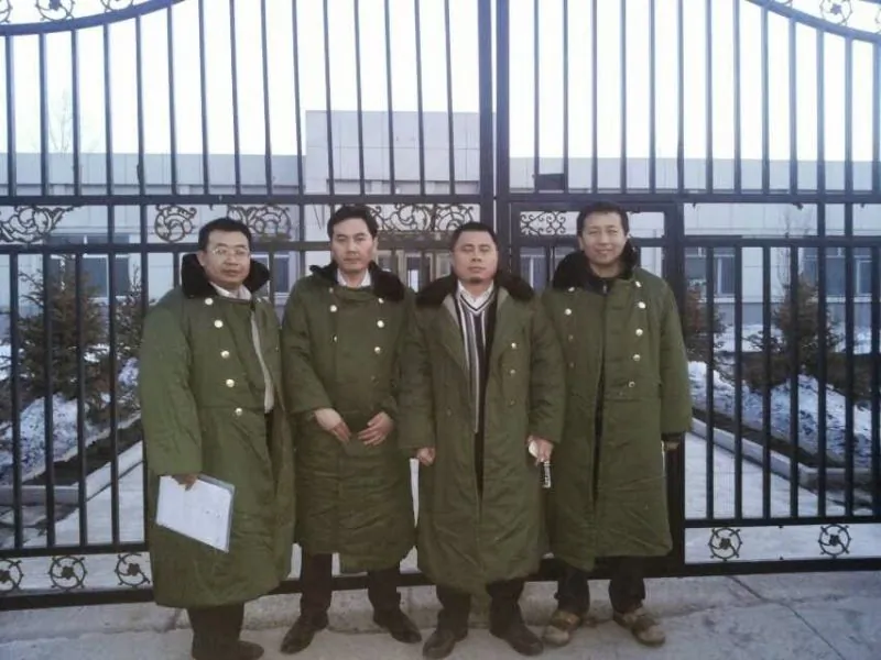 Mainland human rights lawyers (L–R) Jiang Tianyong, Tang Jitian, Wang Cheng, and Zhang Junjie stand outside a brainwashing center before being arrested. They are still in custody. (Courtesy of the subjects)