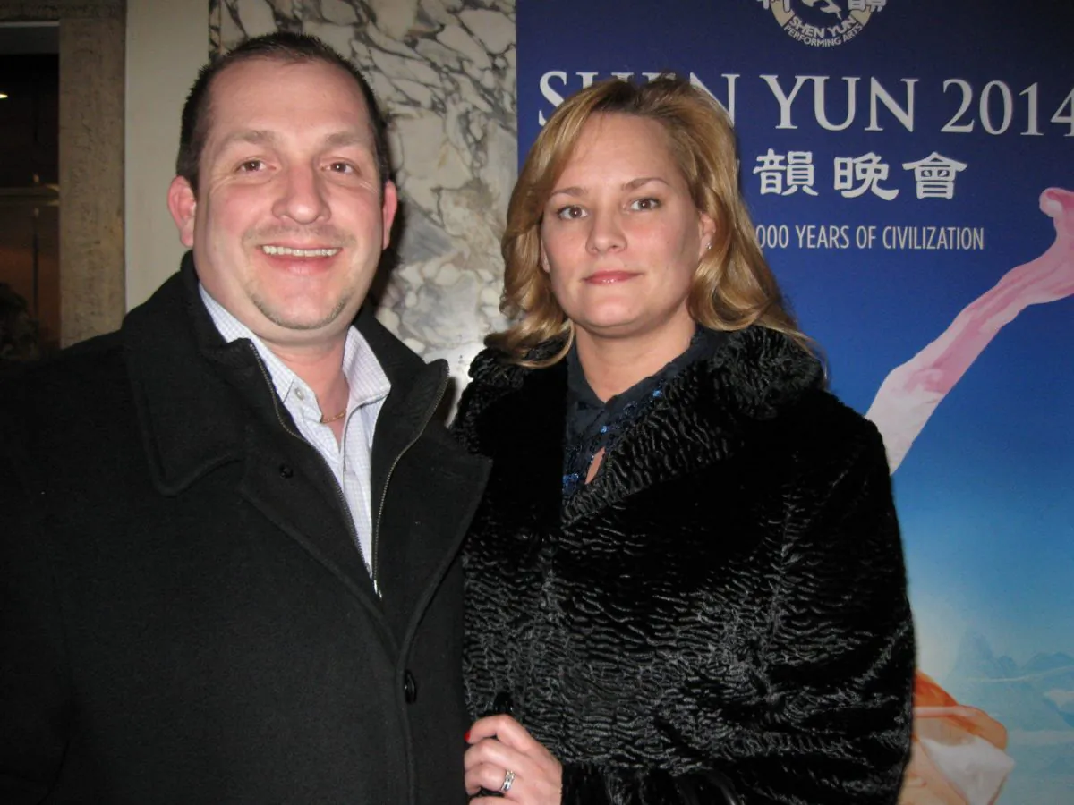Melanie Hegwood and her husband enjoy Shen Yun Performing Arts at Omaha’s Orpheum Theater on the first night of its two-day run. (Cat Rooney/Epoch Times)