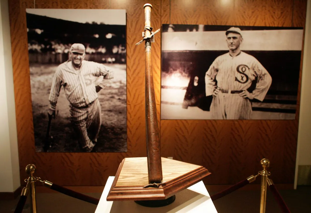 'Shoeless' Joe Jackson's bat stands on display during an auction preview at Sotheby's December 5, 2005 in New York City. The bat, called 'Black Betsy,' will be auctioned December 10 and was last purchased at a 2001 auction for $577,610. (Michael Nagle/Getty Images)